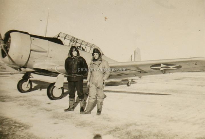 Peter Provenzano Photo Album Image_copy_156.jpg - Pilots in front of a US Army Air Corps North American AT-6A Texan. Airplane transfered to the Royal Canadian Air Force (RCAF), but still in US Army Air Corps markings, 1942.